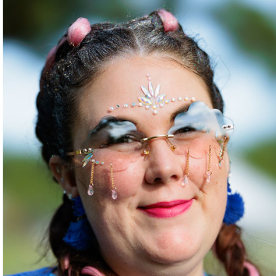 Teyonna Bowman, Tina Marie, and Heather Strassel, pose for portraits ahead of Breastival.
