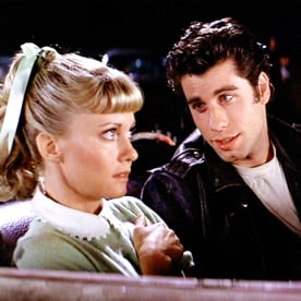 Olivia Newton-John as Sandy and John Travolta as Danny Zuko in Grease
