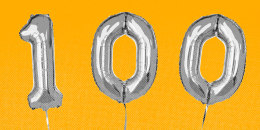 Balloons that spell the number 100, against a yellow background.